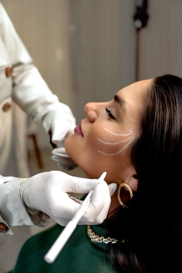 Professional performing a facial treatment
